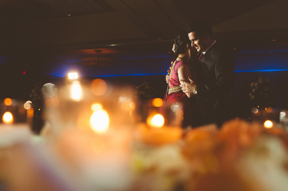 creative Indian wedding photos capturing first dance between bride and groom in reception at Hilton in Parsippany NJ