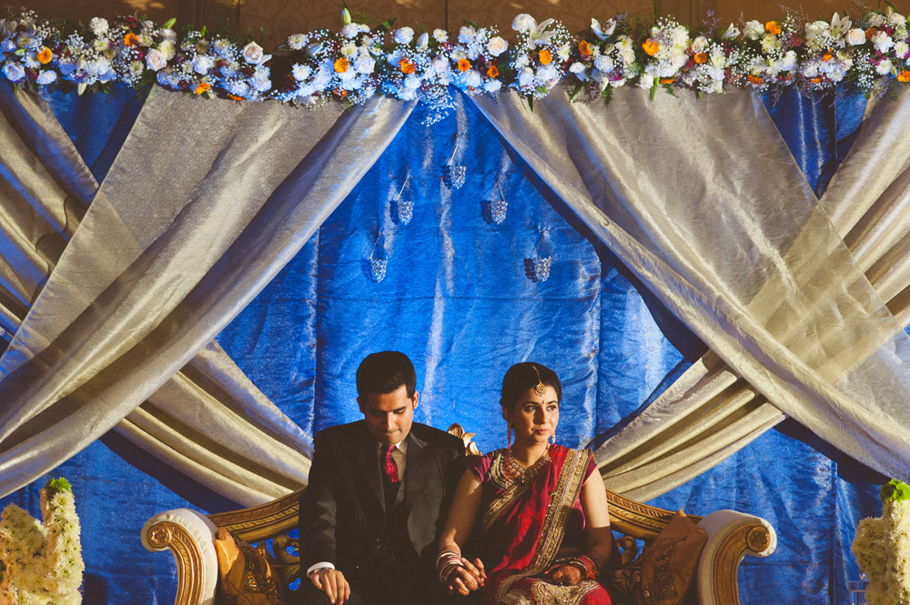 one of many Indian wedding photos of bride and groom on stage during reception at Hilton Hotel in New Jersey