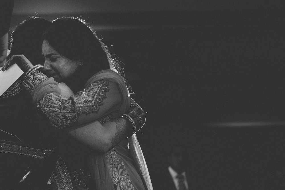 black and white Indian wedding photos capturing emotional moment