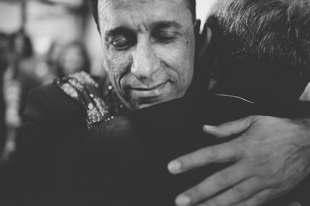 black and white emotional image of creative indian wedding photography during baraat