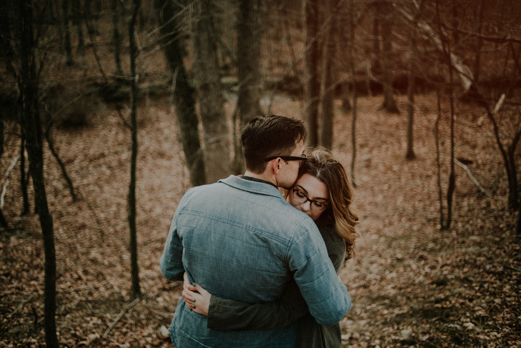 winter engagement pictures in the woods