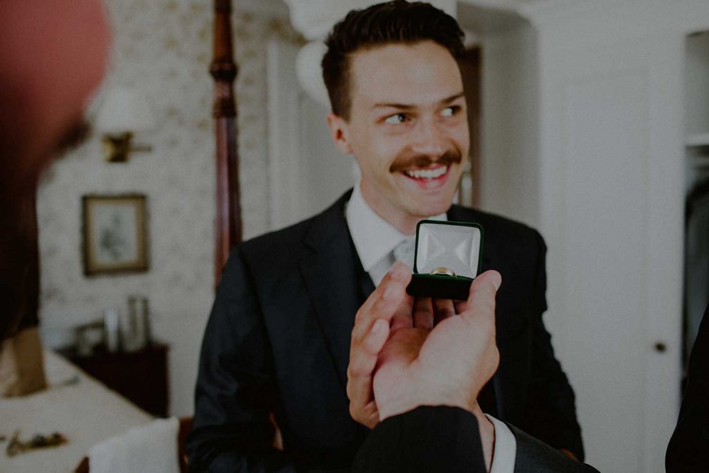 groom gets ready at bonnet island wedding suite