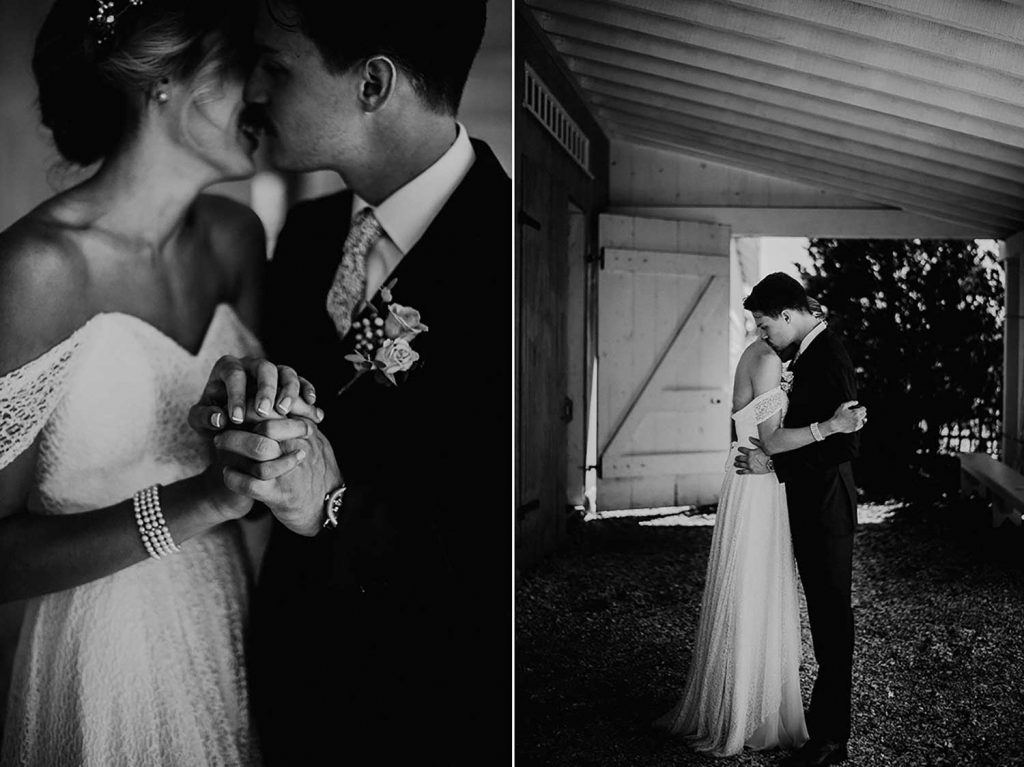 bride and groom emotional portrait in front of barn