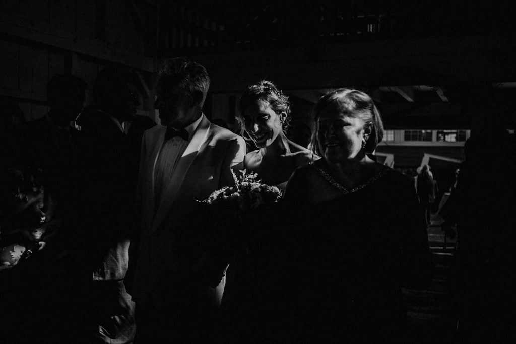 dramatic ceremony entrance of bride in black and white