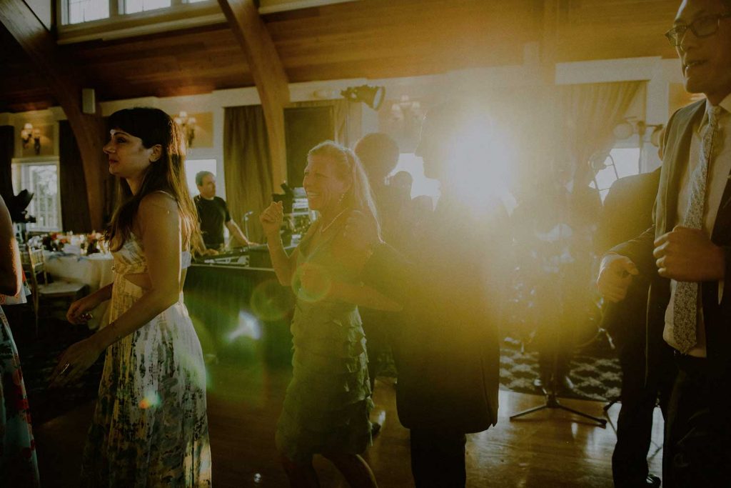 sunset wedding scene on the dance floor