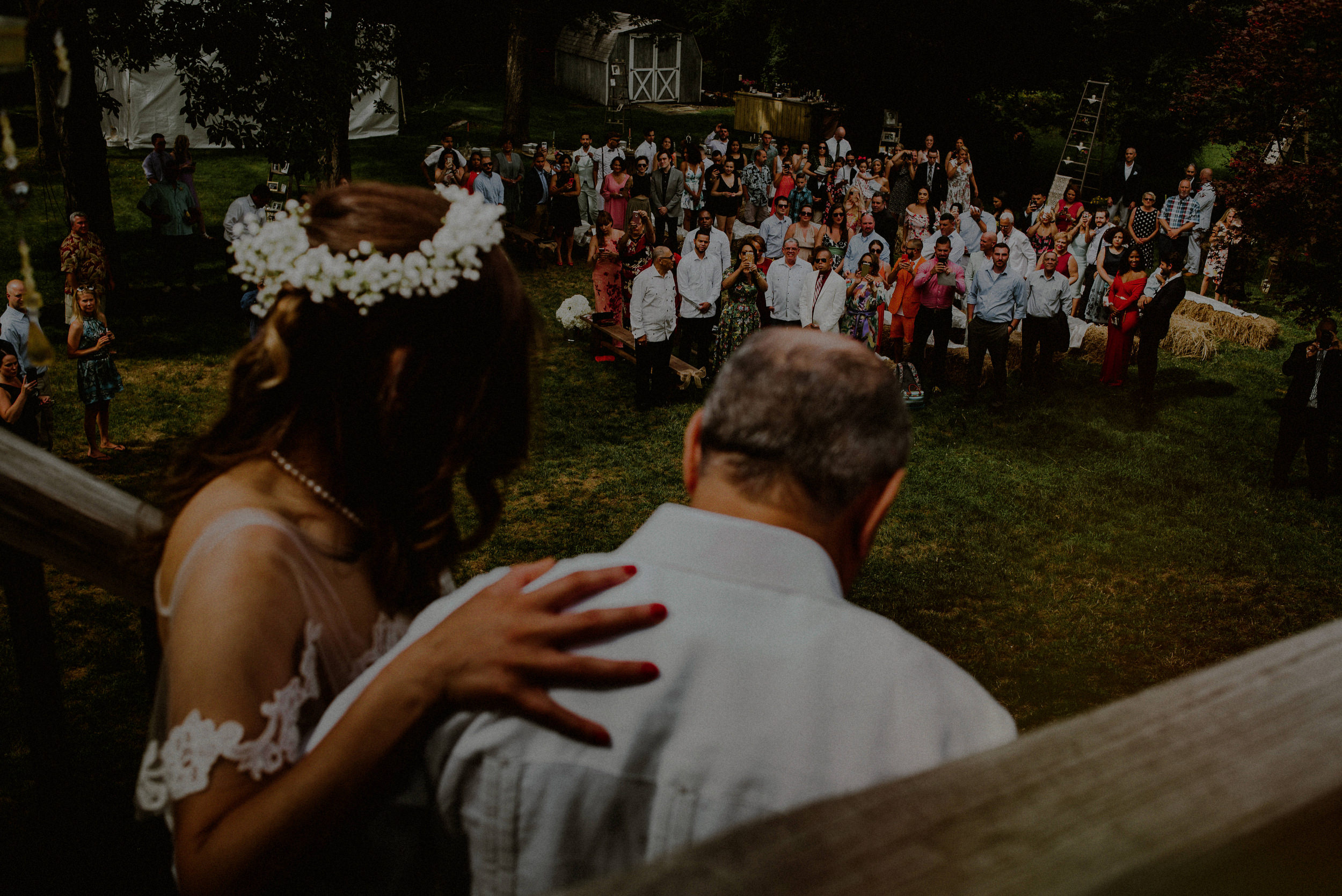 bride and father walking down aisle in backyard wedding