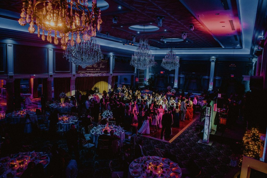 the palace at somerset wedding ballroom with multicolored uplights