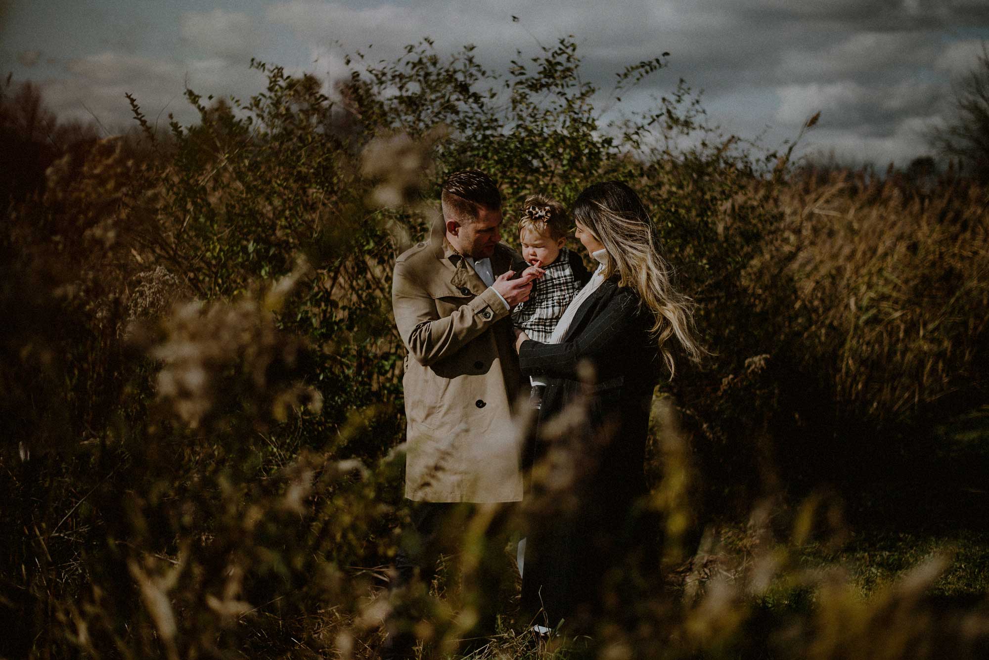 fall family photo with warm fall outfits