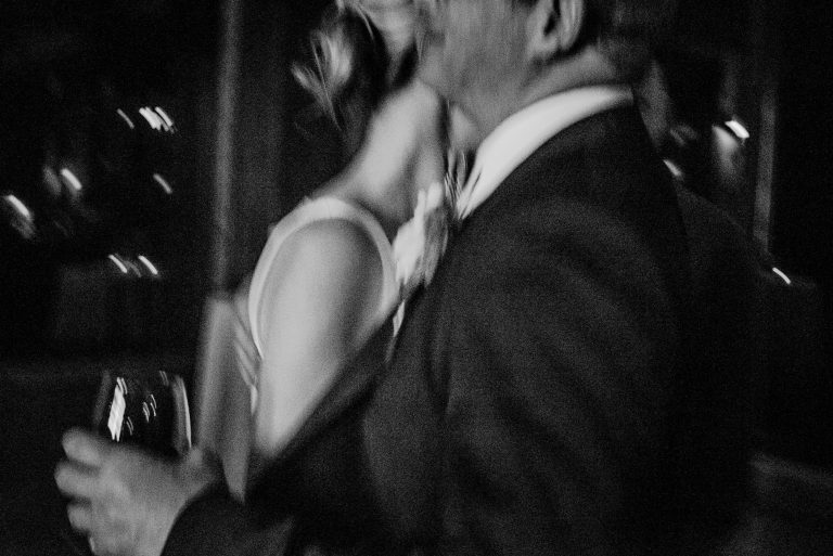 bride and groom embrace after a long wedding in the catskills