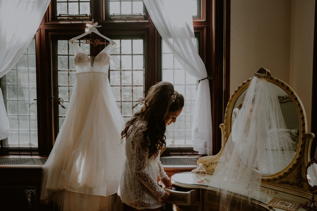 Wedding Photo of bride getting ready at Skylands Manor inside New Jersey Botanical Gardens by Carolina Rivera