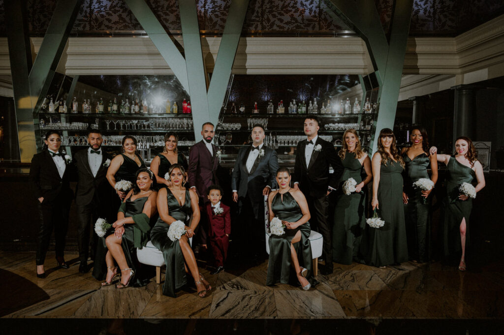 editorial style bridal party photo with dramatic posing