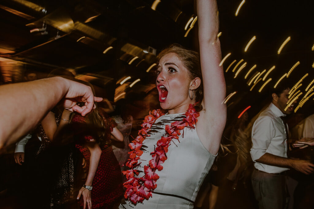 wedding guest screaming or singing at wedding reception