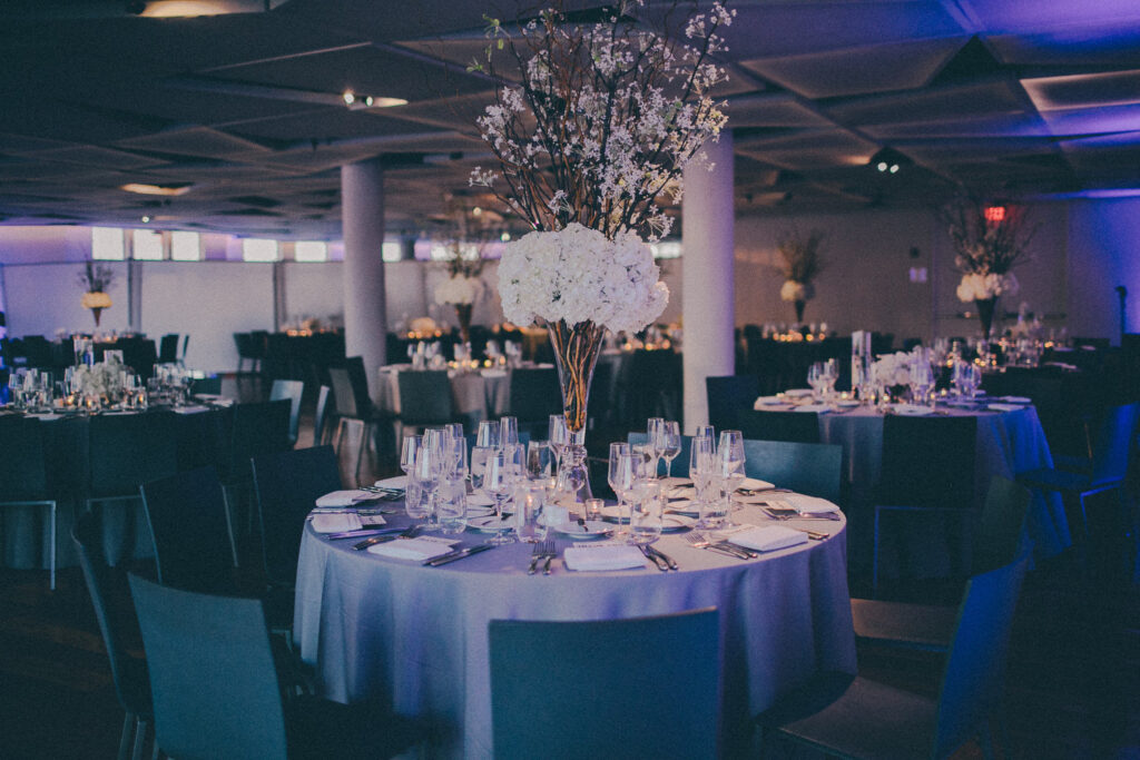 reception tablescapes at maritime parc with blue uplighting