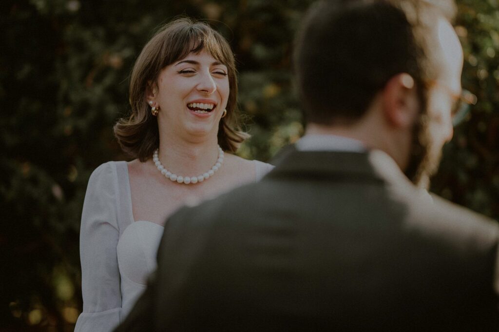 bride laughing with groom