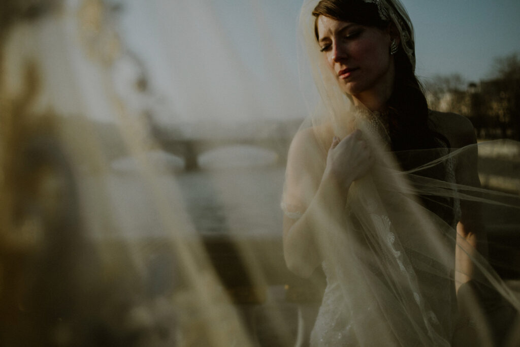 portrait of bride in front of eiffel tower and pont alexandre iii in paris elopement