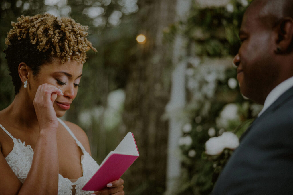 couple emotionally saying vows to each other in an intimate elopement