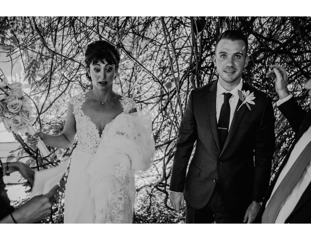 Bride Groom Looking Confused At Grounds For Sculpture Wedding Ceremony