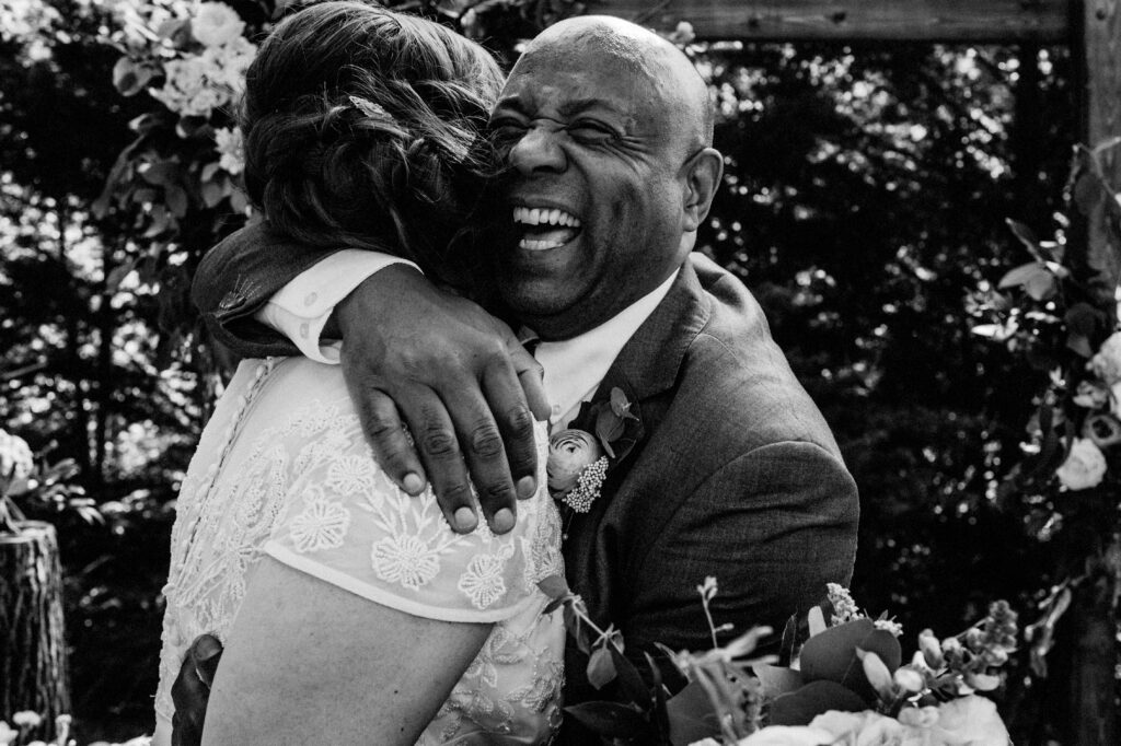Bride Hugging Wedding Guest Emotion Joy Filled
