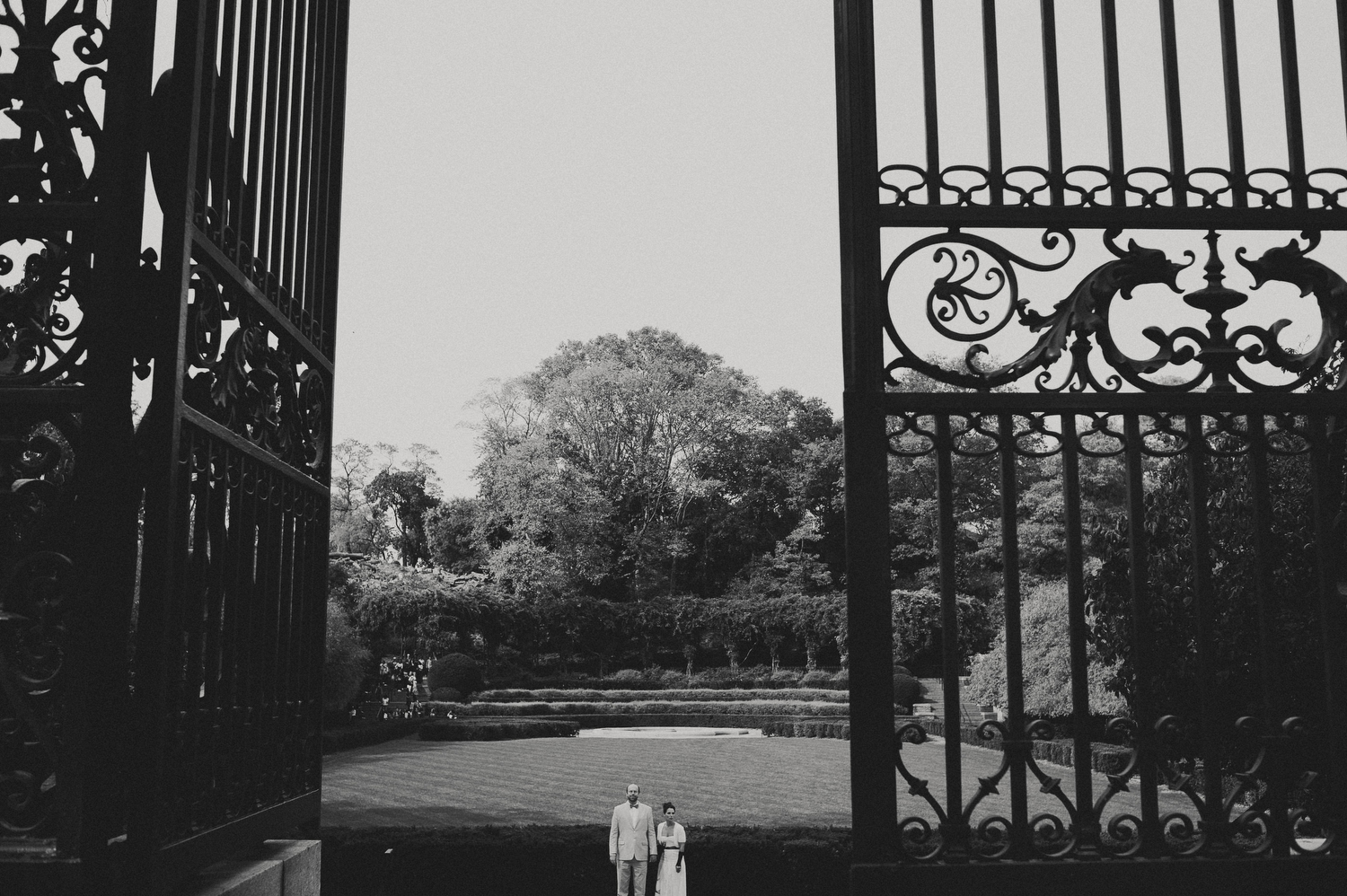 Couple Posed Gate Nyc Conservatory Gardens Elopement