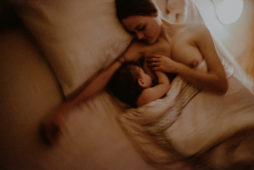 Documentary Family Photo Mother Breastfeeding Child In Bed