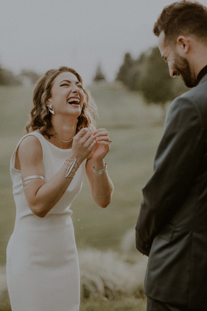 Laughing Bride During Spontaneous Ceremony Moment At Country Club Wedding