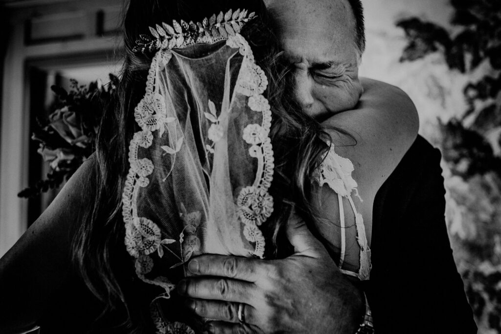 Photojournalistic Wedding Photo Of Father Crying After Seeing Bride